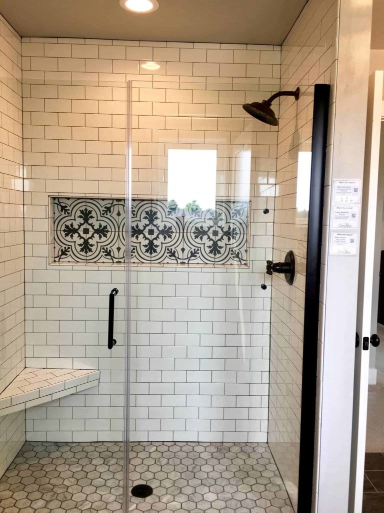 Small white tile alcove bathroom, grey tile floor