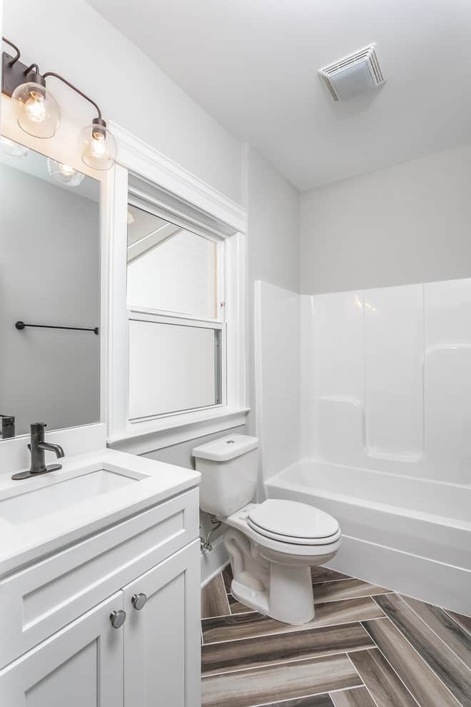 White walls and cabinets, multicolored big tile floor