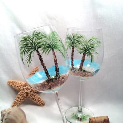 Beach theme palm tree pair of hand painted wine glasses