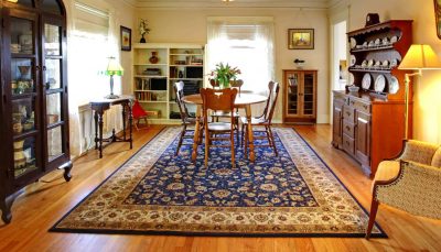 area rug on wood floor in living room