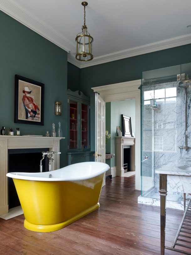 Bathroom - mid-sized victorian master white tile and marble tile medium tone wood floor and brown floor bathroom idea in London with a hinged shower door and green walls