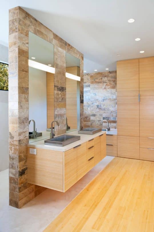Bathroom - mid-sized modern master multicolored tile and stone tile bamboo floor bathroom idea in Seattle with a vessel sink, flat-panel cabinets, light wood cabinets and gray walls