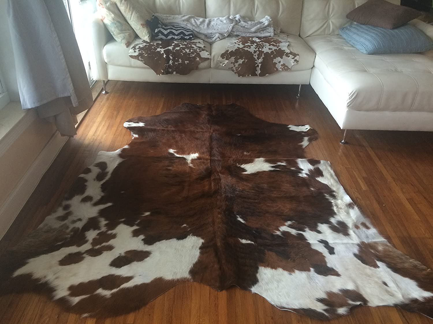 Cowhide On Tile Floor Living Room