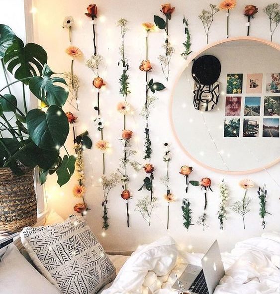 Bedroom with flowers on walls