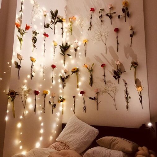 Bedroom with roses on walls